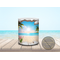 Side view of ceramic drinkware with a coastal ocean design.